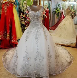 Luxury Princess Crystal Ball Gown Bröllopsklänningar Robes de Mariée Kristaller Beading Sequined Tulle Illusion Back Bridal Gowns With Train
