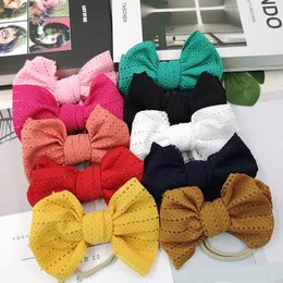 Baby girls bow huvudband 10 färger turban solid färg elasticitet hår tillbehör ihåliga barn hår båge boutique bow-knot hårband