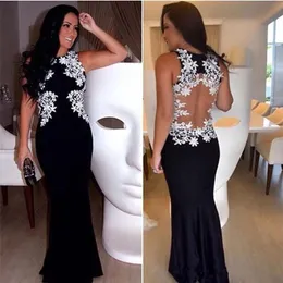 Sexig elegant svart sjöjungfru aftonklänningar Nya juvelhalspetsapplikationer Golvlängd Illusion Back Prom Party Dress Custom Vestidos