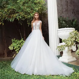 Sheer Kortärmade Lace Appliques A-Line Bröllopsklänningar 2020 Modest Bridal Gowns Custom Formal Soft Tulle Robe de Marie Billiga