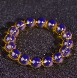 Bracciale con perline di perline di ambra naturale di cera di miele di seconda generazione a mano periferica blu della Dominica 5A naturale