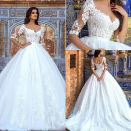 2019 Modest A-Line Abiti da sposa Applique in pizzo Vintage Mezze maniche Bottone coperto Indietro Tulle Cappella Treno Abiti da sposa da sposa