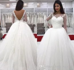 2019 Abito da sposa a maniche lunghe con illusione trasparente sexy Una linea aperta sul retro Tulle Abito da sposa country occidentale con applicazioni di pizzo Custom Made Plus Size