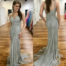 2019 Yeni Varış Sparkly Payetli Mermaid Abiye Gümüş Spagetti Sapanlar Sweep Tren Arapça Seksi Aç Geri Örgün Balo Parti törenlerinde