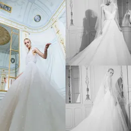 Modest Elie Saab elegante Um vestidos de casamento Linha de Spaghetti mangas Backless Bow Sash Sequins Vestidos de casamento Sweep Trem robe de mariée