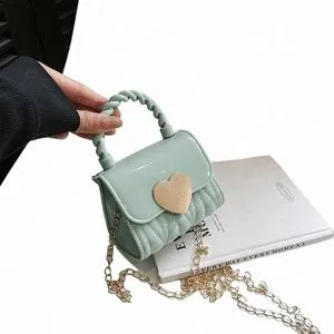 DHgate.com:Jelly Heart Mini Bag: Stylish Hand-Crafted
