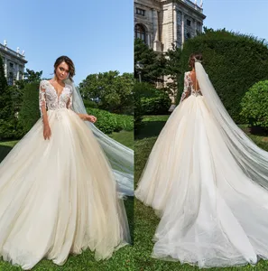Crystal Design Sheer Jewel Neck Lace Ball Gown Wedding Dresses With Long Sleeves Champagne Plus Size Wedding Dress Bridal Gowns