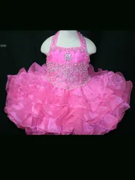 2016 all'ingrosso belle ragazze rosa abiti da spettacolo organza halter collo cerniera posteriore che borda corsetto a file volant gonna arco fiore ragazze vestito