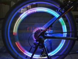 Pacchetto di vendita al dettaglio Testa di teschio colorato Bici da bicicletta Valvola della gomma Ruota Flash Lampada a LED, 1000 pezzi / lotto (2 pezzi per confezione)