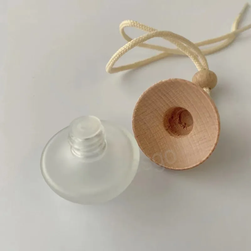 Car Hanging Perfume Bottles Refillable Essential Oil Bottle Oval Glass Perfumes Bottle Pendant Wood Lid Transparent Container BH6778 TYJ