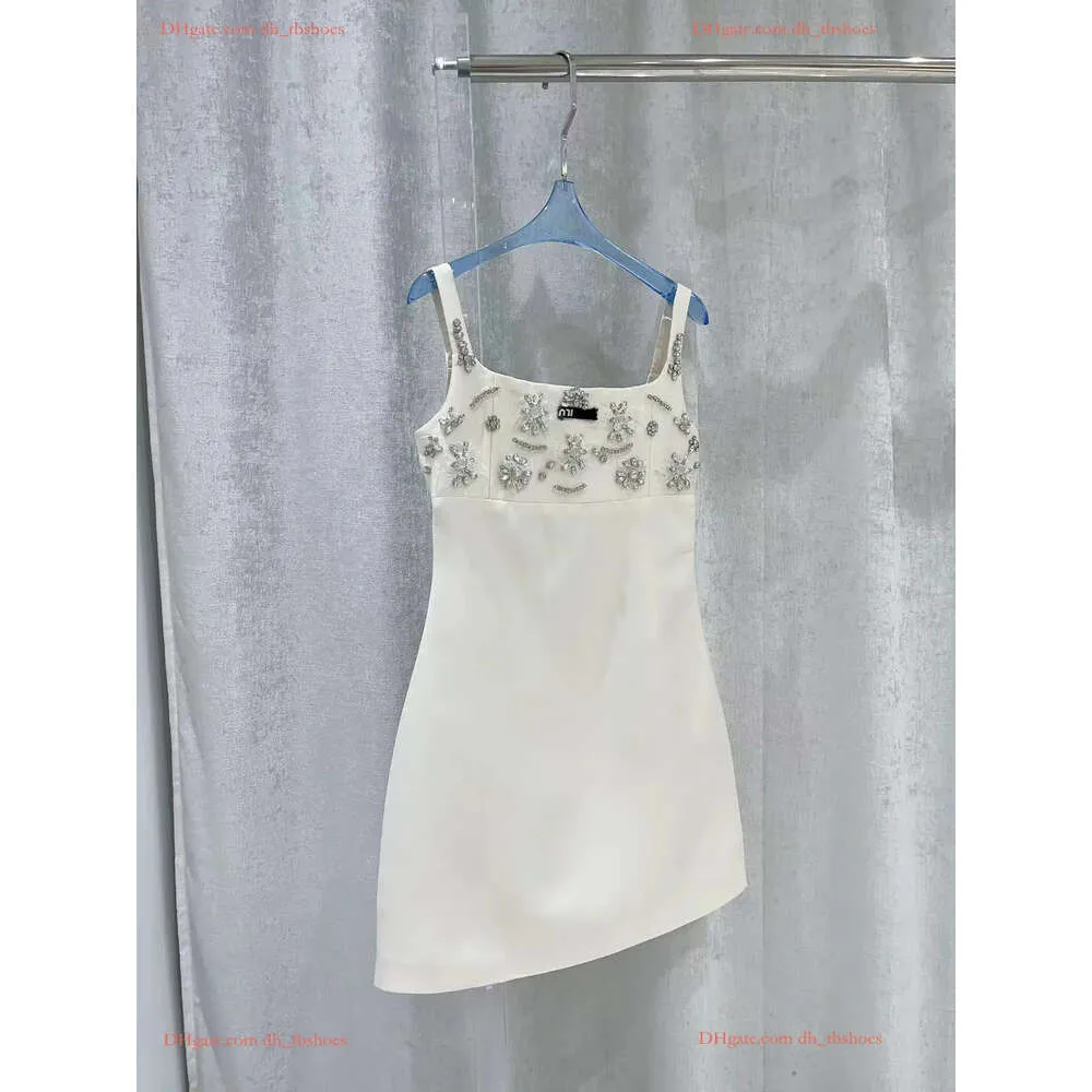 Diseñador de mujeres estilo diamante estampado de leopardo vestidos de fiesta vestido blanco camisas sin mangas tops faldas planas mujer delgada