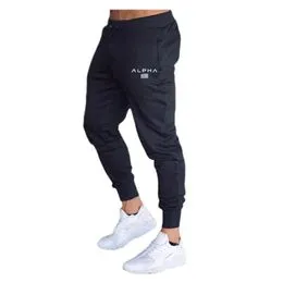 Nueva marca para hombre correr corredores Casual pantalones Fitness  transpirable moda flaco pantalones de chándal negro gimnasios Jogger  pantalones de