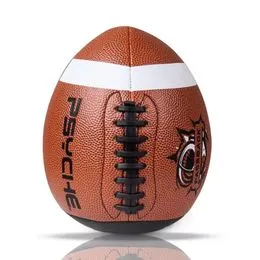 Ballon De Football Américain Sur Fond Noir éclairé Par La Lumière
