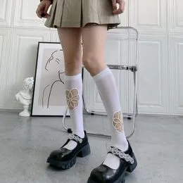 Calcetines sobre rodilla con diseño de lazo  Medias mujer, Calcetines y  medias, Moño negro