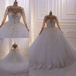 Mariage Bridal Ballgown Magnifique robes robes en dentelle Crystaux Appliquez les manches longues perlées