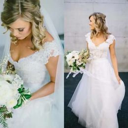 Robes de robe de mariée de mariage magnifique une ligne V cou de couche sans manches en dentelle applique Longueur de plancher en tulle