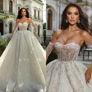 Mariage Crystal perle sans bretelles Boule de balle Bridal Sequins Princess Sans manches Illusion Robes de mariée Fabriqué sur mesure