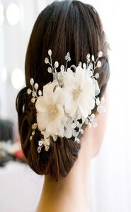 Flores de boda accesorios de alfileres impresionantes perlas de cristal sombreros nupciales accesorios para el cabello de boda hechos a mano.