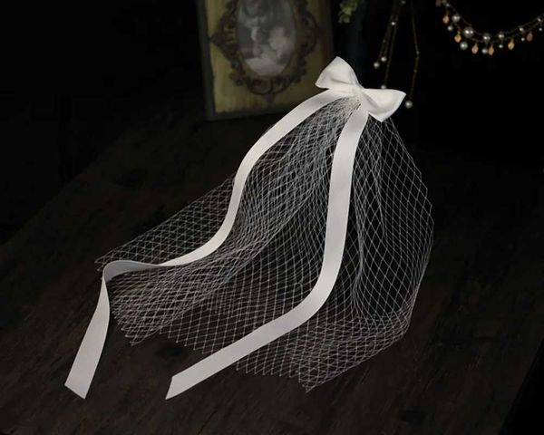 Bijoux de cheveux de mariage Corée Cut Edge Veille nuptiale Satin Ribbon Bow Netting Blanc White Mandmade Wedding Veil for Bride Perform Party