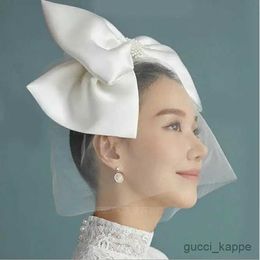 Bruiloft haar sieraden Koreaanse stijl bruiloft sluier korte tule cover face face bruids sluiers boog bruid sluiers bruiloft accessoires