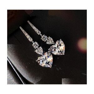 Ensembles de bijoux de mariage Choucong Marque Set Luxe Superbe Forme De Coeur Blanc Topaze CZ Diamant Pierres Précieuses Éternité Dangle Boucle D'oreille Femmes C Dhan1