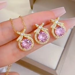 Set di gioielli da sposa Moda elegante rosa goccia d'acqua cristallo fiocco nodo ciondolo collana orecchini per le donne ricevimento nuziale squisito 230808