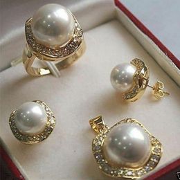 Conjuntos de joyería de boda FYS004 Opciones de varios colores Blanco verde AAAA CZ South Sea Shell Pearl Ring Pendant Earring Set 230511