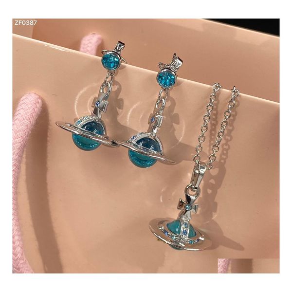 Conjuntos de joyas de boda Lujosas damas Collares Brazalete Pendientes de botón Collar Pulseras Pendiente con colgante de planeta de cristal azul Dhtbe occidental