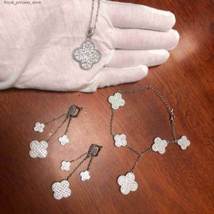 Bruiloft Sieraden Sets Groothandel Vier Blad Bloem Hanger Lange Set Ketting Oorbellen Dames Luxe Prachtige Sieraden 925 Sterling Zilver Q240316