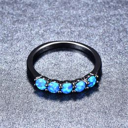 Trouwringen Bamos Boho Vrouwelijke kleine stenen ring Blue Fire Opal voor vrouwen Zwart goud gevulde banden Simple Round Ringwedding