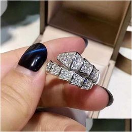 Anillos de boda Choucong Marca Lujo 925 Sterling Sier Pave White Sapphire Cz Diamond Eternity Party Mujeres Serpiente Anillo de banda para los amantes DHVJU