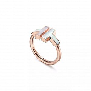 Wedding Rings modeontwerper X-vormige roestvrijstalen sier Love Ring Cross tussen diamanten mannen en vrouwen rose gouden sieraden paar ot2tf