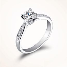 Anneaux de mariage Fine US Certificat 18K Or blanc 1 Ct Moissanite Bagues de fiançailles pour femmes Coeurs et flèches Mariage Diamant 3504 Q2 Dhj2D