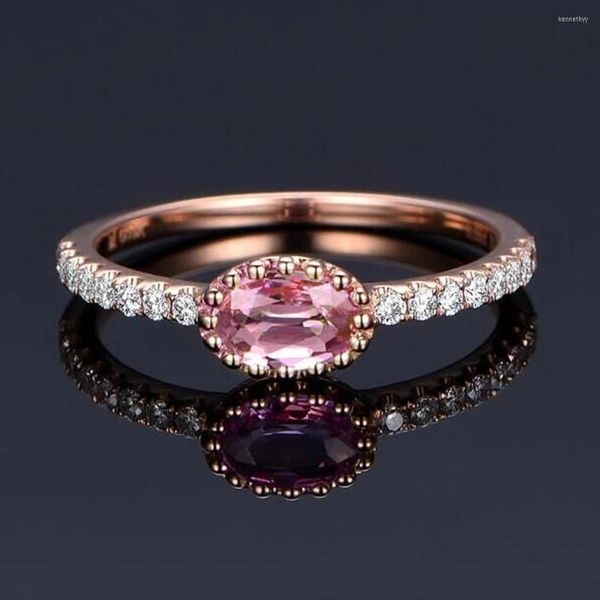 Anneaux de mariage Huitan bague de fiançailles délicate pour les femmes couleur or rose avec pierre ovale rose conception simple éblouissant CZ bijoux de mode