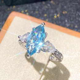 Anneaux de mariage Huitan série de zircon cubique bleu ciel pour femmes bandes de fiançailles romantiques accessoires bijoux de fête de dame élégante