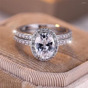 Anillos de boda Anillo de piedra ovalada de cristal de lujo Conjunto de circón blanco Forma de huevo Compromiso para mujeres Joyería nupcial de color plateado clásico