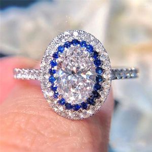 Anillos de boda de lujo para mujer, anillo de circón azul pequeño, Color plateado rosado para mujer, abalorio de moda, compromiso de piedra blanca grande