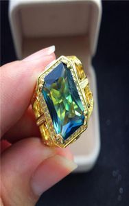 Anneaux de mariage mâle femelle Blue Zircon Big Stone Ring Luxury Yellow Gold Party Finger Vintage Promise Engagement pour les femmes Men Gift2140325