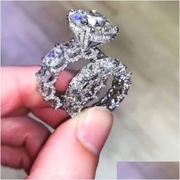 Anéis de casamento Nova Chegada Top Vender Jóias de Luxo 925 Sterling Sier Grande Corte Redondo Branco Topázio Cz Diamante Casal Anéis Mulheres Casamento Dhr02