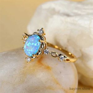 Wedding ringen ovaal gesneden mystic blauw witte vuur opaalringen voor vrouwen goud kleur charme regenboog geboortesteen trouwringen bruids verlovingsring cz