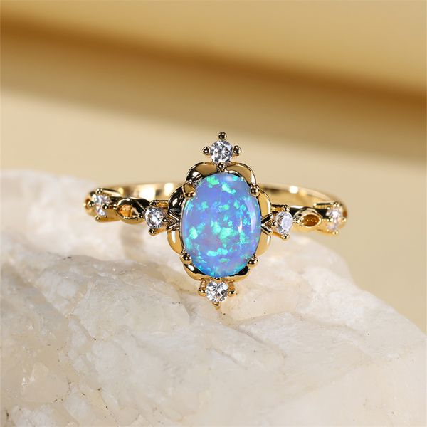 Anillos de boda Oval Cut Mystic Blue White Fire Opal para mujeres Gold Color Charm Rainbow Birthstone Bands Anillo de compromiso nupcial CZ 230721