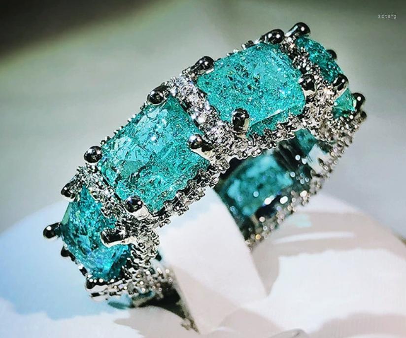 Proceso de anillos de boda Anillo de topacio del tesoro azul marino para mujeres y hombres