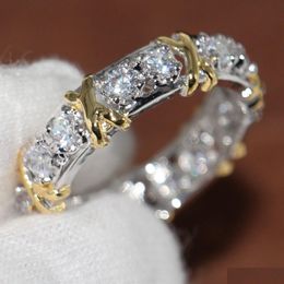 Anillos de bodas Anillos Venta al por mayor Eternidad profesional Diamonique Cz Diamante simulado 10kt Oro amarillo blanco Banda llena Anillo cruzado Tamaño 5 Dhbol