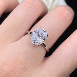 Wedding Rings Solid 14K Platinum Au585 PT950 Vier klauwen eenvoudige en modieuze ei -vormige diamanten ring Moissanite dames Q240511