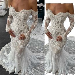 Vestidos de sirena sexy de boda Sweetheart Off Shoulder Lace Appliques Pearls Mangas largas Ilusión Vestidos Sheer Vestidos de Novia GOWNS DE NIECESO Africa Mariee Mariee