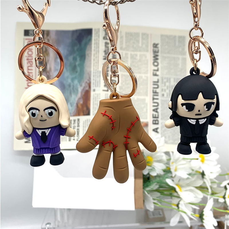 Onsdag Addams Charm PVC Keychain Palm Animation Pendant Små saker mobiltelefonband bryter hand 4 -stilar