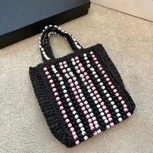 Fin de semana Cesta de cuentas de diseñador Bolso de playa de paja Viaje de la ciudad Para mujer para hombre bolso de mano bolso de mano Bolso de hombro tejido de verano de lujo Bolsos cruzados