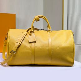 Bolso de lona de fin de semana Bolso de mano de diseñador Bolsos de gran capacidad Bolso de equipaje unisex Bolsos de hombro Bolso de fin de semana de cuero genuino de alta calidad Paquetes al aire libre de diseñador