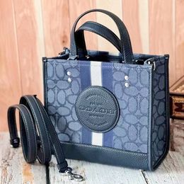 Sac de week-end Dempsey Field Sac de créateur de luxe pour femme Le fourre-tout Pochette en cuir en toile Sac à main noir Boutique Embrayage Bandoulière Voyage pour hommes Sacs à bandoulière pour dame