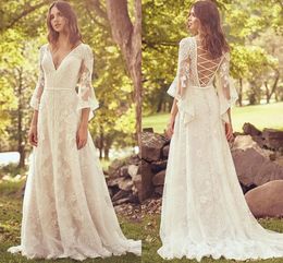 Western Country Hippie Cowgirl A-lijn Trouwjurken V-hals Flare Lange mouwen Boheemse Kant Bruidsjurken Lace-up Back Vintage Bruid Receptie Feestgewaden CL2643